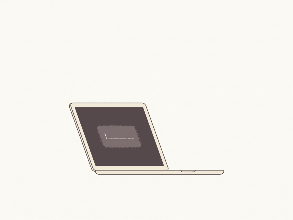 A laptop closing partway, its screen glowing with an unfinished cursor line
